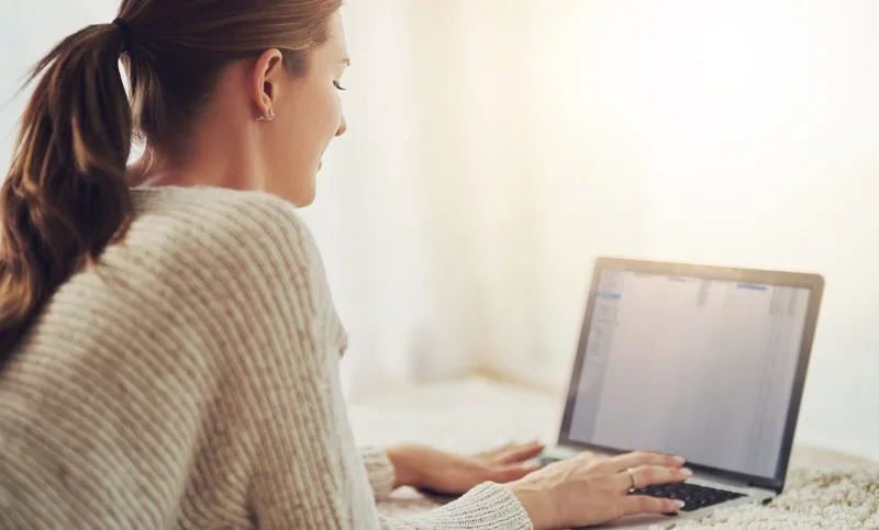 Person using Gmail on a laptop